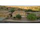 Aerial view of desert neighborhood featuring multi-story homes and desert landscaping at 16401 S 29Th Ave, Phoenix, AZ 85045