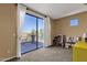 Neutral bedroom features a door to the patio with mountain views, and play kitchen at 16401 S 29Th Ave, Phoenix, AZ 85045