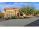 Beautiful single-Gathering home featuring a desert landscape, stone accents, and a tile roof with a two-car garage at 16401 S 29Th Ave, Phoenix, AZ 85045