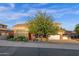 This charming single-Gathering home features a two-car garage, lovely landscaping, and stone accents at 16401 S 29Th Ave, Phoenix, AZ 85045