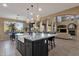 Gourmet kitchen with stainless steel appliances and custom cabinetry with abundant counter space at 16401 S 29Th Ave, Phoenix, AZ 85045