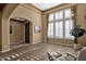 Comfortable living room with hardwood floors, plantation shutters and beautiful natural light at 16401 S 29Th Ave, Phoenix, AZ 85045