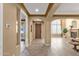 Spacious open-concept living room featuring gorgeous hardwood floors and abundant natural light at 16401 S 29Th Ave, Phoenix, AZ 85045