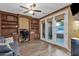 Bright office features custom built-ins, wood floors, and access to outdoor patio through French doors at 16401 S 29Th Ave, Phoenix, AZ 85045