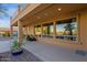 Covered back patio with ceiling lights and view of private yard, and exterior of home at 16401 S 29Th Ave, Phoenix, AZ 85045