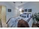 Comfortable bedroom with closet, artwork, and neutral color scheme at 1654 E Jardin Pl, Casa Grande, AZ 85122