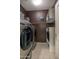 Laundry room with modern washer and dryer and closet space at 1654 E Jardin Pl, Casa Grande, AZ 85122
