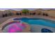Inviting backyard pool and spa, surrounded by desert landscaping and privacy walls at 1654 E Jardin Pl, Casa Grande, AZ 85122