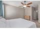 Bedroom featuring carpeted floors, neutral colored walls, and a ceiling fan at 16954 W Mohave St, Goodyear, AZ 85338