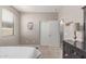 Bedroom featuring carpeted floors and natural light from the window at 16954 W Mohave St, Goodyear, AZ 85338