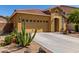 Beautiful home with desert landscaping and a two-car garage at 16954 W Mohave St, Goodyear, AZ 85338