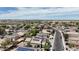 Scenic aerial view of a residential neighborhood with mountain views and homes with solar panels at 1758 E San Xavier Dr, Casa Grande, AZ 85122
