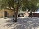 The spacious backyard features a covered patio and desert landscaping at 1758 E San Xavier Dr, Casa Grande, AZ 85122