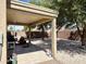 Covered patio offers shade and outdoor living space overlooking the backyard at 1758 E San Xavier Dr, Casa Grande, AZ 85122