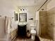 Bathroom features a modern vanity, framed mirror, and tiled shower at 1758 E San Xavier Dr, Casa Grande, AZ 85122