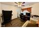 Bedroom/office space features a ceiling fan, tile flooring, and a window at 1758 E San Xavier Dr, Casa Grande, AZ 85122