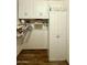 Walk-in storage closet with cabinets and tile flooring at 1758 E San Xavier Dr, Casa Grande, AZ 85122