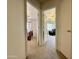 Hallway view to bedroom and to sitting area with fan and lots of light at 1758 E San Xavier Dr, Casa Grande, AZ 85122