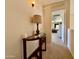 Hallway view to bedroom with fan and lots of natural light at 1758 E San Xavier Dr, Casa Grande, AZ 85122