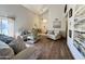 Bright living room with vaulted ceilings, wood-look tile flooring, and comfortable seating at 1758 E San Xavier Dr, Casa Grande, AZ 85122