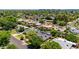 Idyllic aerial view of residential neighborhood with a variety of houses, solar panels, and mature landscaping at 1839 E Palo Verde Dr, Phoenix, AZ 85016