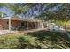Expansive backyard featuring lush grass, patio, pool, and privacy fence at 1839 E Palo Verde Dr, Phoenix, AZ 85016