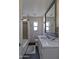 Traditional bathroom with marble vanity, tub-shower combo, and neutral tones at 1839 E Palo Verde Dr, Phoenix, AZ 85016