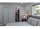 Bedroom closet features organized shelves and ample storage with sliding doors at 1839 E Palo Verde Dr, Phoenix, AZ 85016