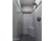 Modern walk-in shower features gray tiled walls, a niche for toiletries, and a showerhead at 1839 E Palo Verde Dr, Phoenix, AZ 85016