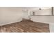 Open-concept living area with wood floors, a ceiling fan, and a seamless transition at 1887 E La Donna Dr, Tempe, AZ 85283