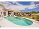 Refreshing backyard pool and meticulously maintained lawn, perfect for entertaining at 19347 E Thornton Rd, Queen Creek, AZ 85142