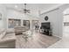 Open-concept living room featuring modern furniture and abundant natural light at 19651 N 34Th St, Phoenix, AZ 85050