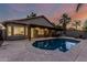Beautiful backyard pool with stamped concrete and a covered patio at 19651 N 34Th St, Phoenix, AZ 85050