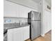 Modern kitchen with stainless steel appliances, granite countertops, and ample cabinet space at 20100 N 78Th Pl # 3103, Scottsdale, AZ 85255