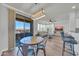 Open floor plan featuring dining area, living room, and balcony with a scenic view at 20100 N 78Th Pl # 3103, Scottsdale, AZ 85255
