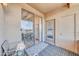Cozy patio with sliding glass doors and a relaxing seating area, perfect for enjoying the outdoors at 20100 N 78Th Pl # 3103, Scottsdale, AZ 85255
