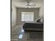 Bedroom featuring a ceiling fan, neutral color palette, and area rug at 2013 E Valencia Dr, Phoenix, AZ 85042