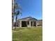 Beautiful stucco home with mature landscaping and a covered patio at 2013 E Valencia Dr, Phoenix, AZ 85042