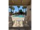 Community pool with lounge chairs at 2013 E Valencia Dr, Phoenix, AZ 85042