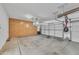 Spacious three car garage features built-in storage, providing ample space for vehicles and organization at 209 N 237Th Ave, Buckeye, AZ 85396