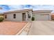 Charming single-story home with a tile roof, desert landscaping, and a two-car garage at 2326 E Spruce Dr, Chandler, AZ 85286