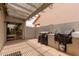 Covered patio featuring brick flooring and grilling area, perfect for outdoor entertaining at 2326 E Spruce Dr, Chandler, AZ 85286