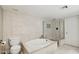 Bright bathroom featuring a soaking tub, glass-enclosed shower, and tiled walls at 3030 N Hayden Rd # 28, Scottsdale, AZ 85251