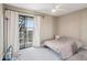 Bedroom with a sliding glass door, and neutral walls at 3030 N Hayden Rd # 28, Scottsdale, AZ 85251
