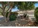 Beautifully landscaped community with lush greenery, water features, and well-maintained townhomes at 3030 N Hayden Rd # 28, Scottsdale, AZ 85251