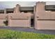 Modern townhome featuring attached garages, offering convenient parking and stylish curb appeal at 3030 N Hayden Rd # 28, Scottsdale, AZ 85251