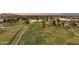 Overhead view of golf course with mature trees, pond, and manicured grounds at 3030 N Hayden Rd # 28, Scottsdale, AZ 85251