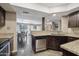 Inviting kitchen area with modern appliances and view to the open living space and dining at 3030 N Hayden Rd # 28, Scottsdale, AZ 85251