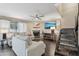 Bright living room features a fireplace, large sliding glass doors, and comfortable furnishings at 3030 N Hayden Rd # 28, Scottsdale, AZ 85251