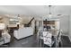 Spacious living area with stairs, dining area, and open kitchen with bar seating at 3030 N Hayden Rd # 28, Scottsdale, AZ 85251